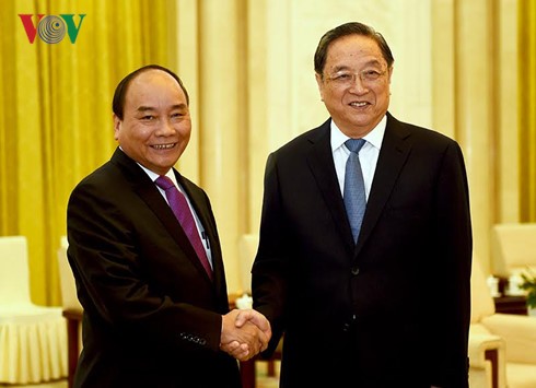 Нгуен Суан Фук встретился с председателем Народного политического консультативного совета КНР - ảnh 1